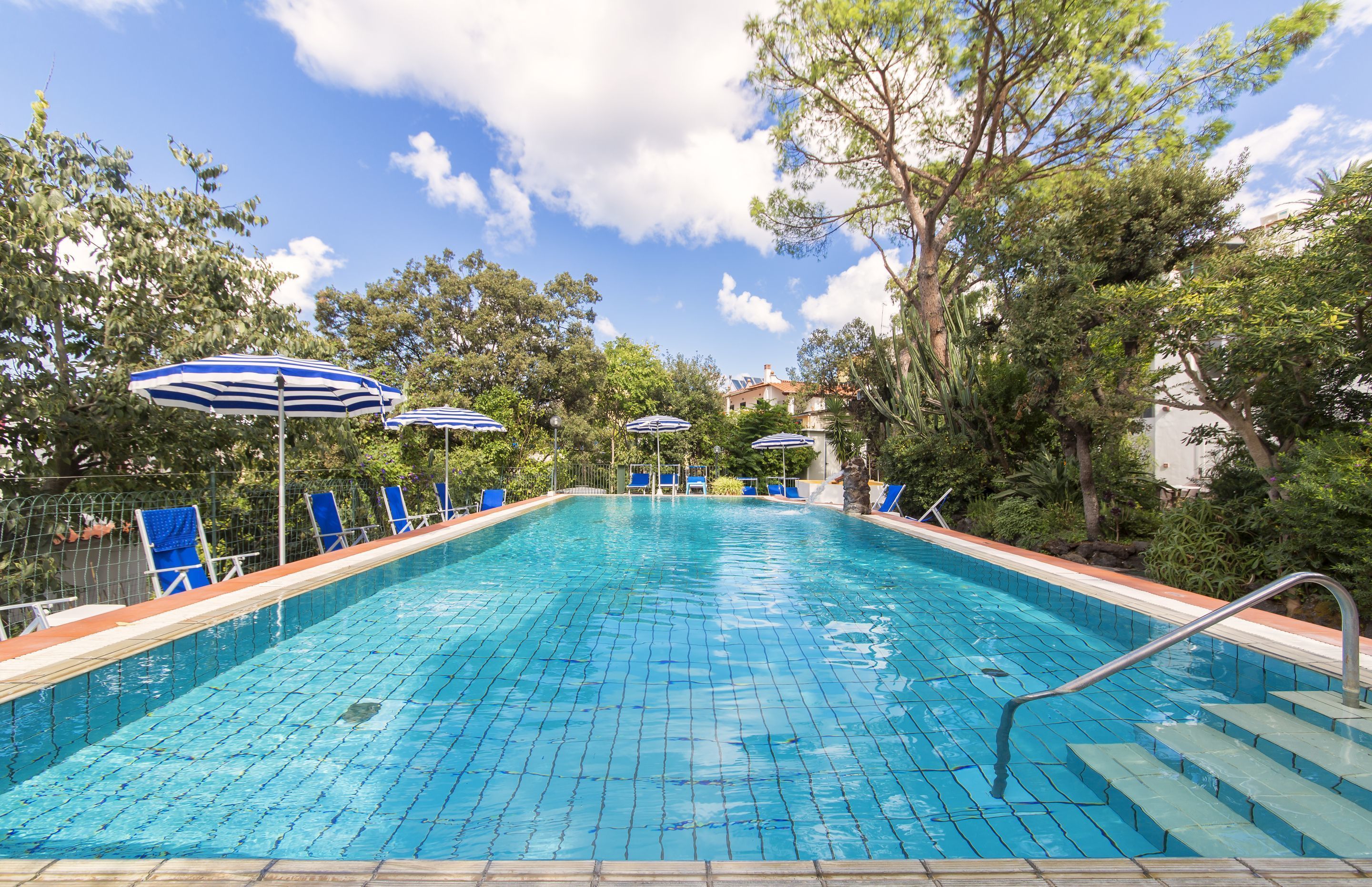 2 outdoor pools, pool umbrellas, pool loungers