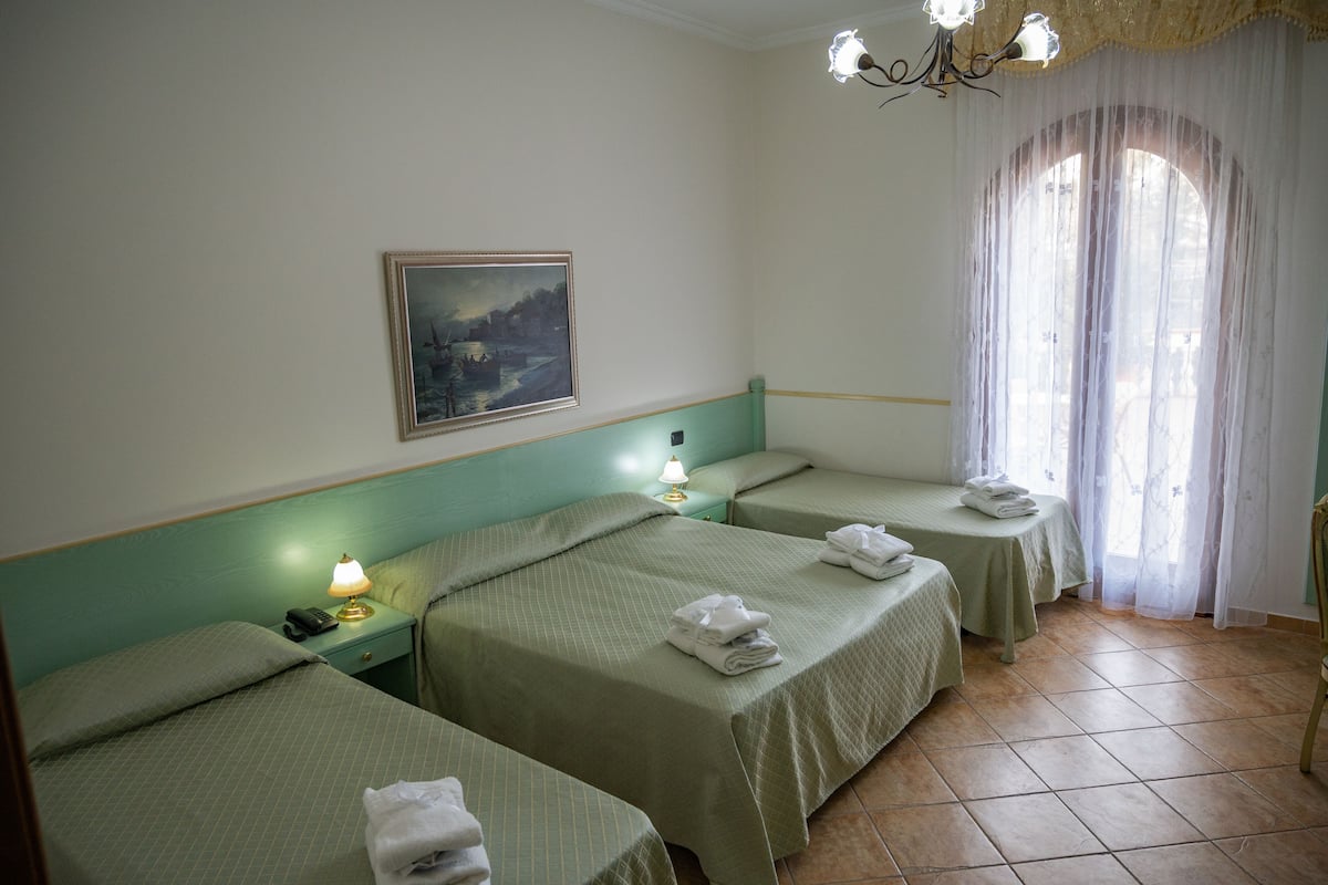 Economy Quadruple Room | Premium bedding, down duvets, minibar, in-room safe