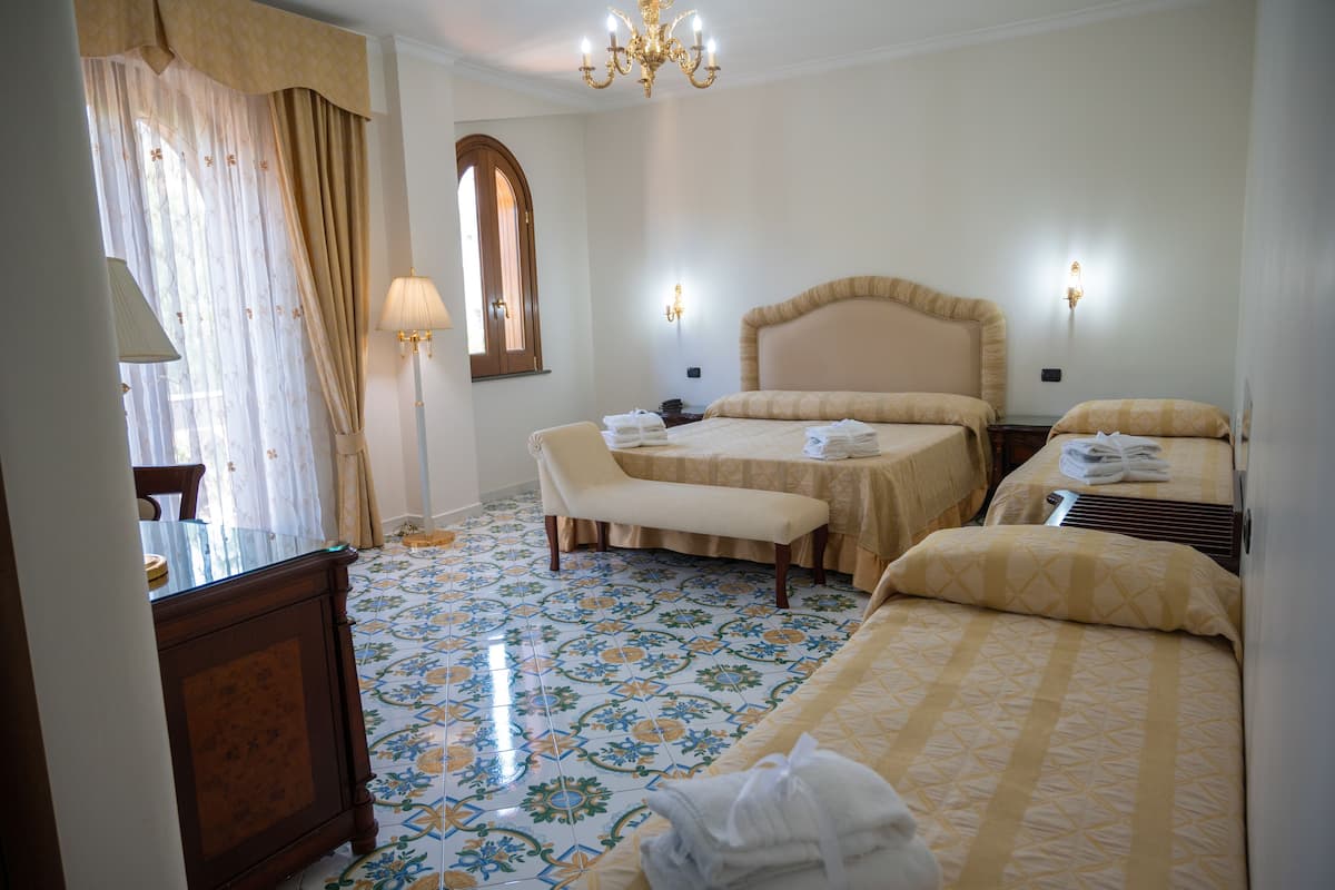 Quadruple Room | Premium bedding, down duvets, minibar, in-room safe