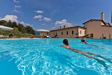 Indoor pool, seasonal outdoor pool, pool umbrellas, sun loungers