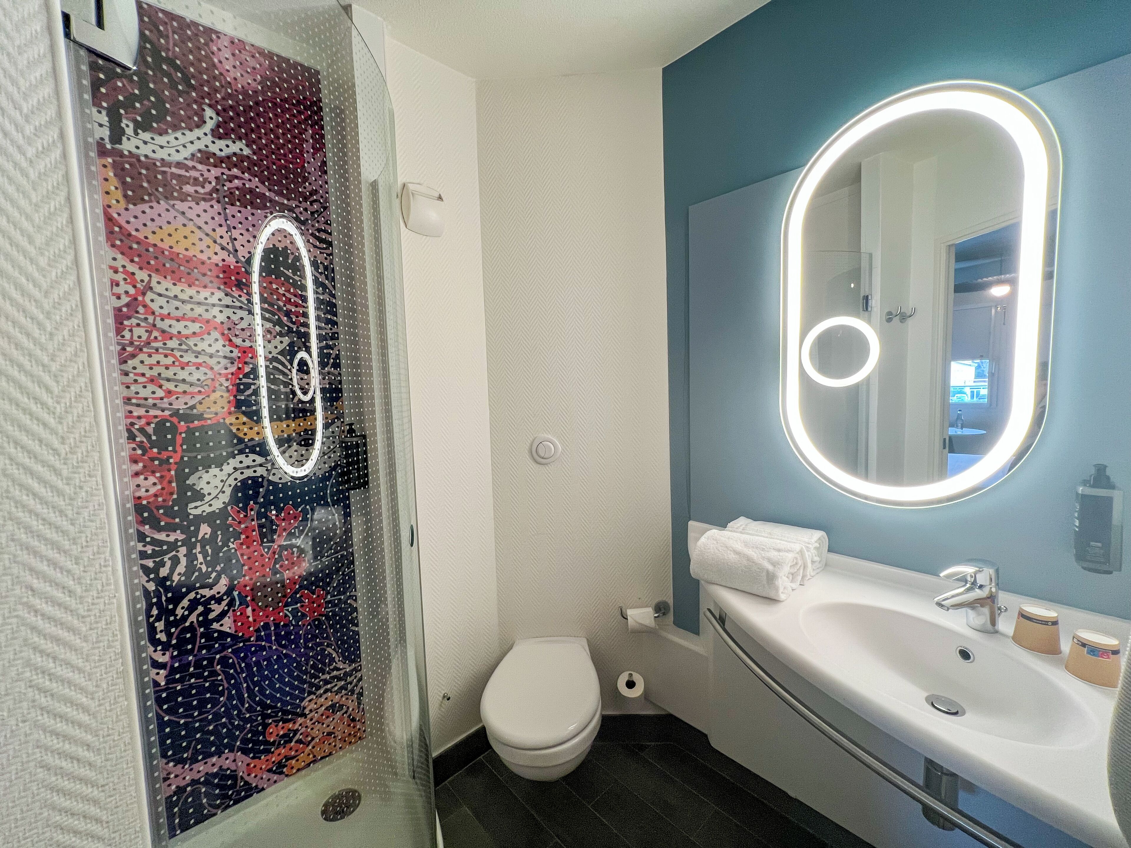 shower, eco-friendly toiletries, hair dryer, towels