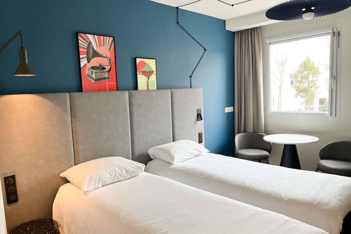 standard twin room | premium bedding, desk, blackout curtains, soundproofing