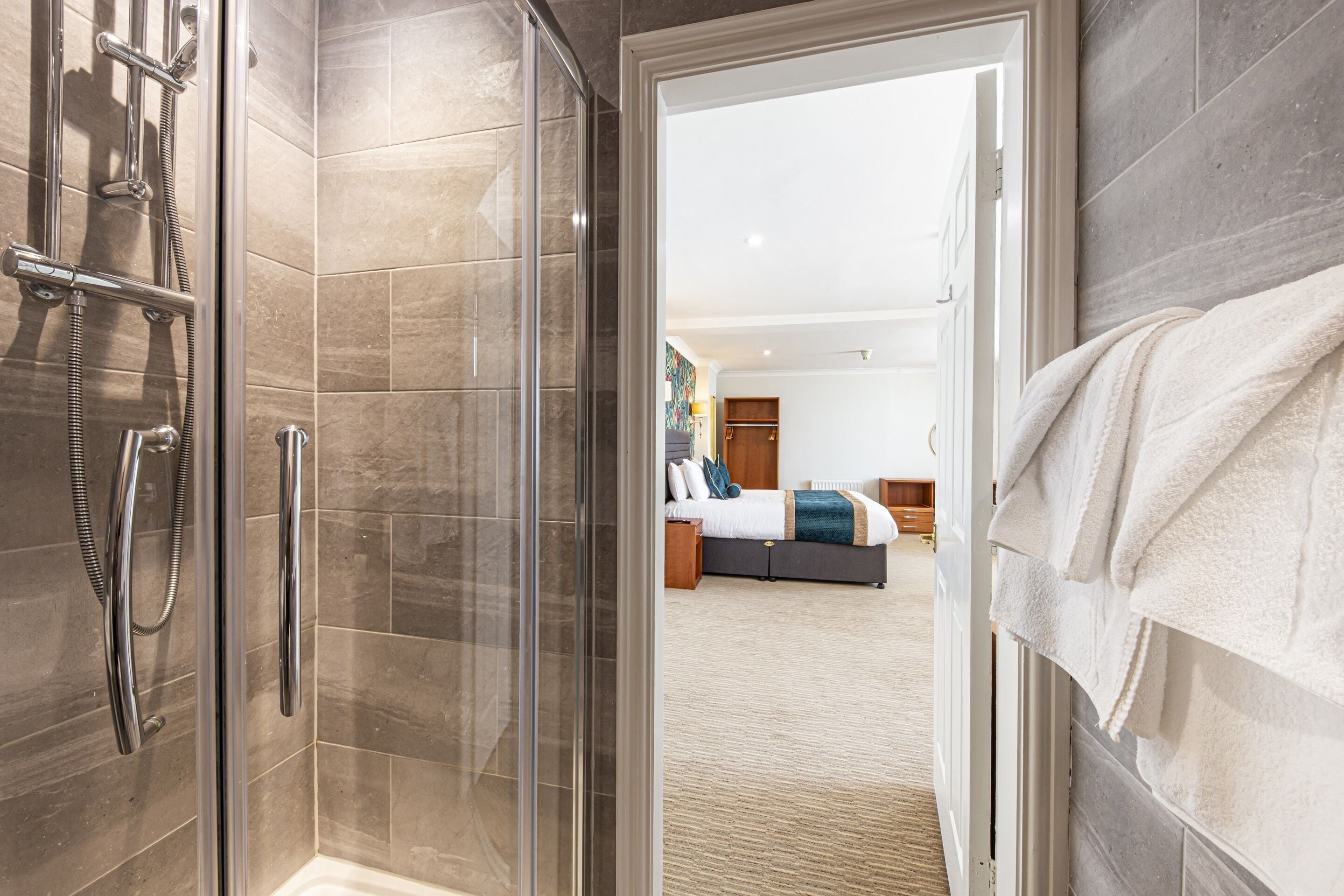 shower, free toiletries, hair dryer, towels