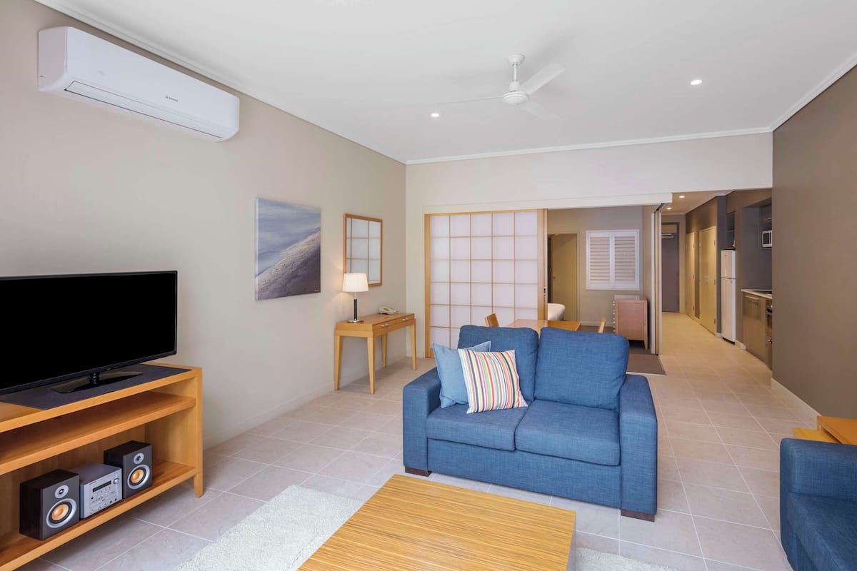 Apartment, 1 Bedroom, Ocean View | 1 bedroom, in-room safe, desk, blackout curtains