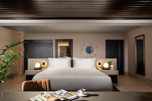 Suite | Frette Italian sheets, premium bedding, down comforters, in-room safe
