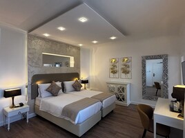 Double or Twin Room | Minibar, in-room safe, individually decorated, desk