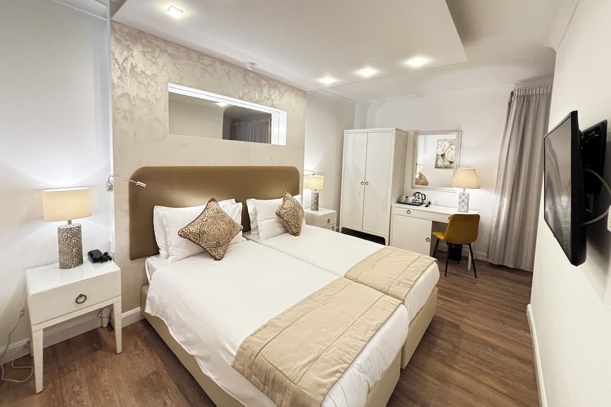 Minibar, in-room safe, individually decorated, desk