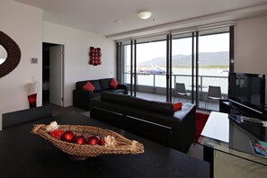 Standard Apartment, 1 Bedroom, Harbor View | Living room | 42-inch LCD TV with digital channels, TV - Cairns Private Apartments (Cairns)