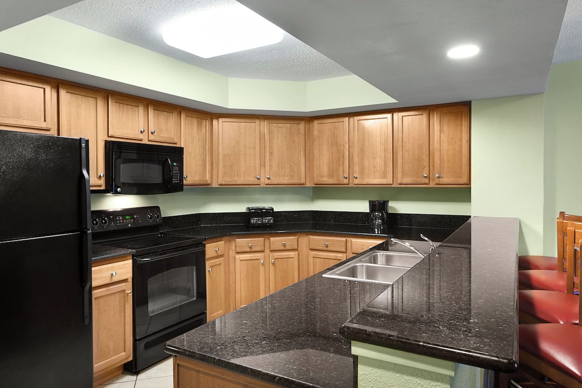 Oceanfront Two Bedroom Condo D | Private kitchen | Fridge, microwave, coffee/tea maker