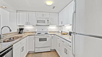 Condo, 2 Bedrooms, Beachfront | Private kitchen | Coffee/tea maker, fridge, microwave, stovetop
