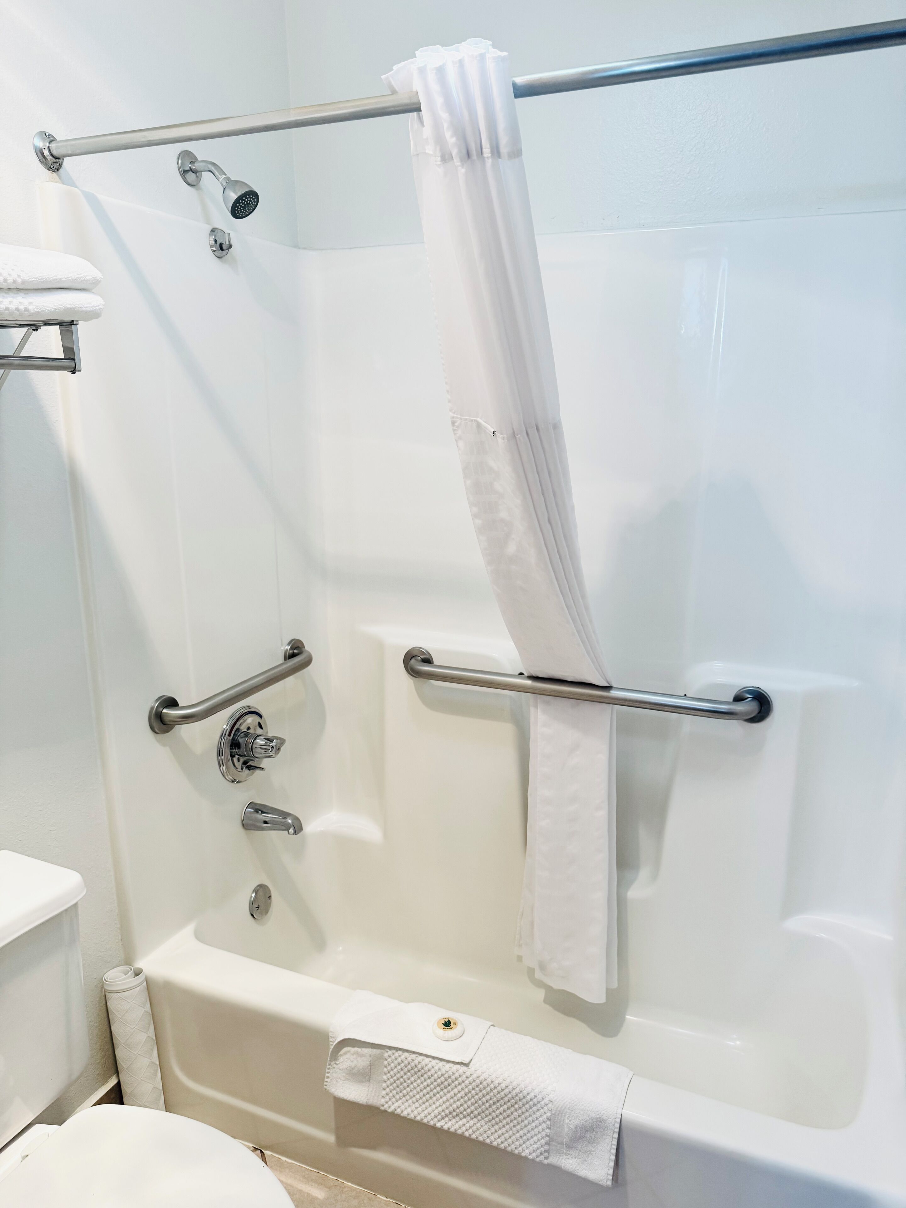 standard double room, 2 queen beds | bathroom | combined shower/bathtub, free toiletries, hair dryer, towels