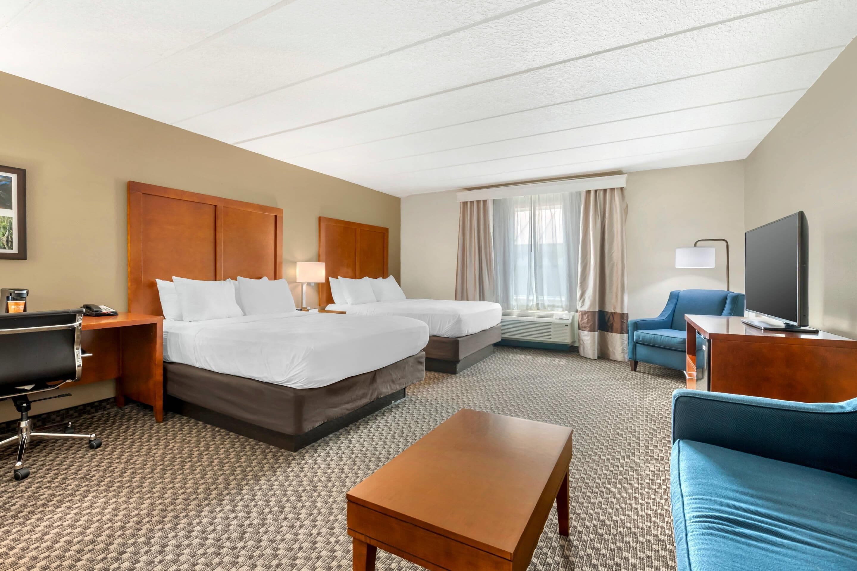 Suite, Multiple Beds, Non Smoking | Pillowtop beds, in-room safe, desk, blackout drapes