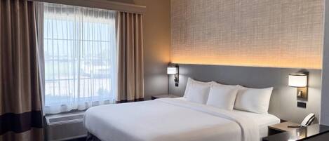 Suite estándar, 1 cama de matrimonio grande, no fumadores | Sábanas de algodón egipcio, ropa de cama de alta calidad, caja fuerte