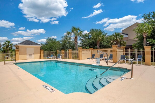 Outdoor pool, open 9:00 AM to 10:00 PM, pool loungers