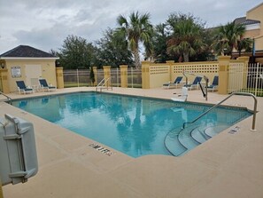 Outdoor pool, open 9:00 AM to 10:00 PM, sun loungers