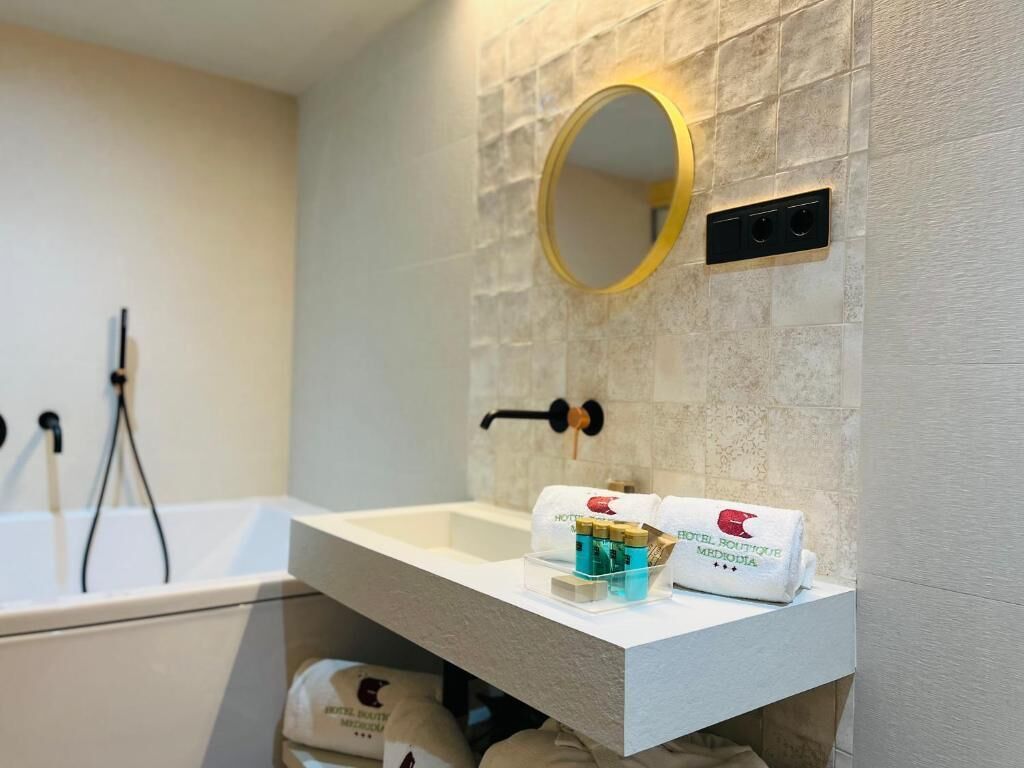 superior room | bathroom | bathtub, deep-soaking bathtub, free toiletries, hair dryer