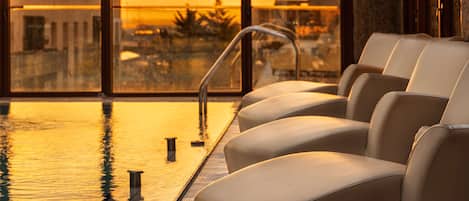 Indoor pool, outdoor pool, open 4:00 PM to 8:00 PM, pool loungers