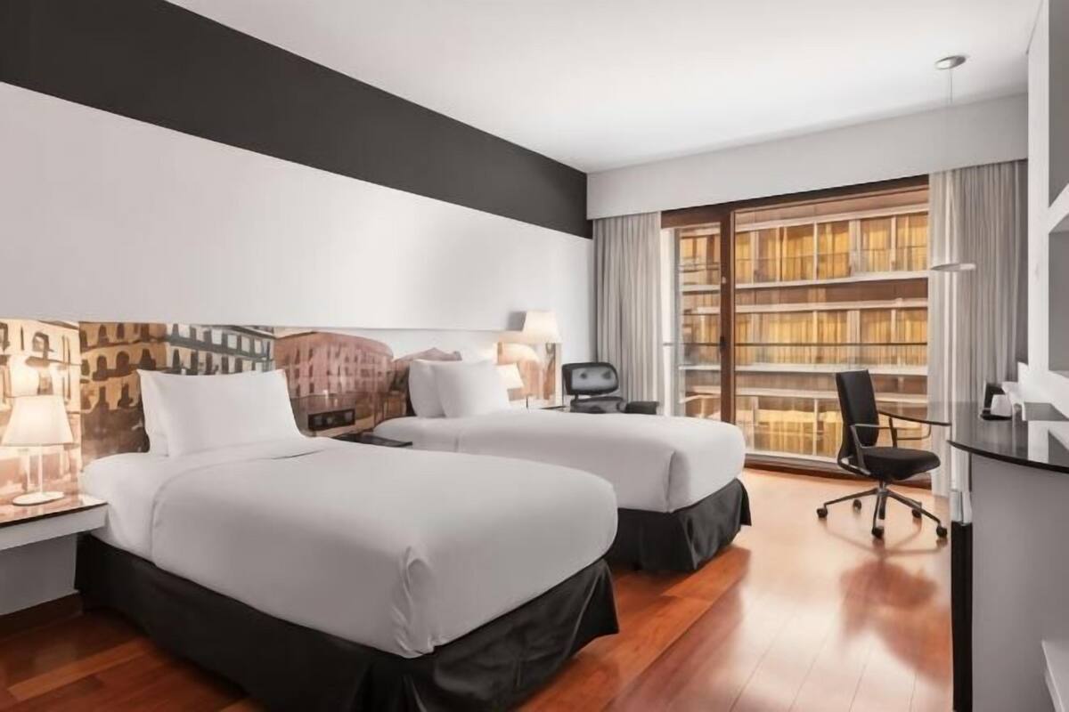 Ropa de cama de alta calidad y minibar