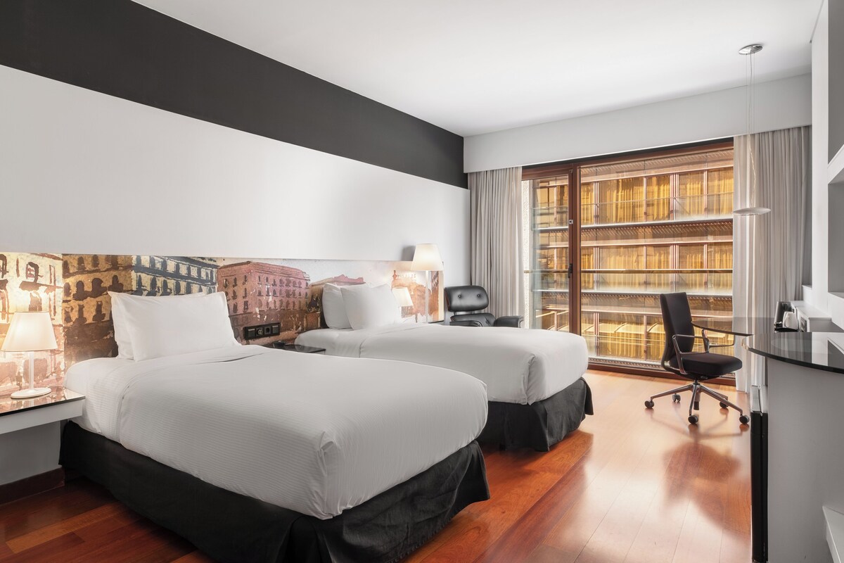 Ropa de cama de alta calidad y minibar 