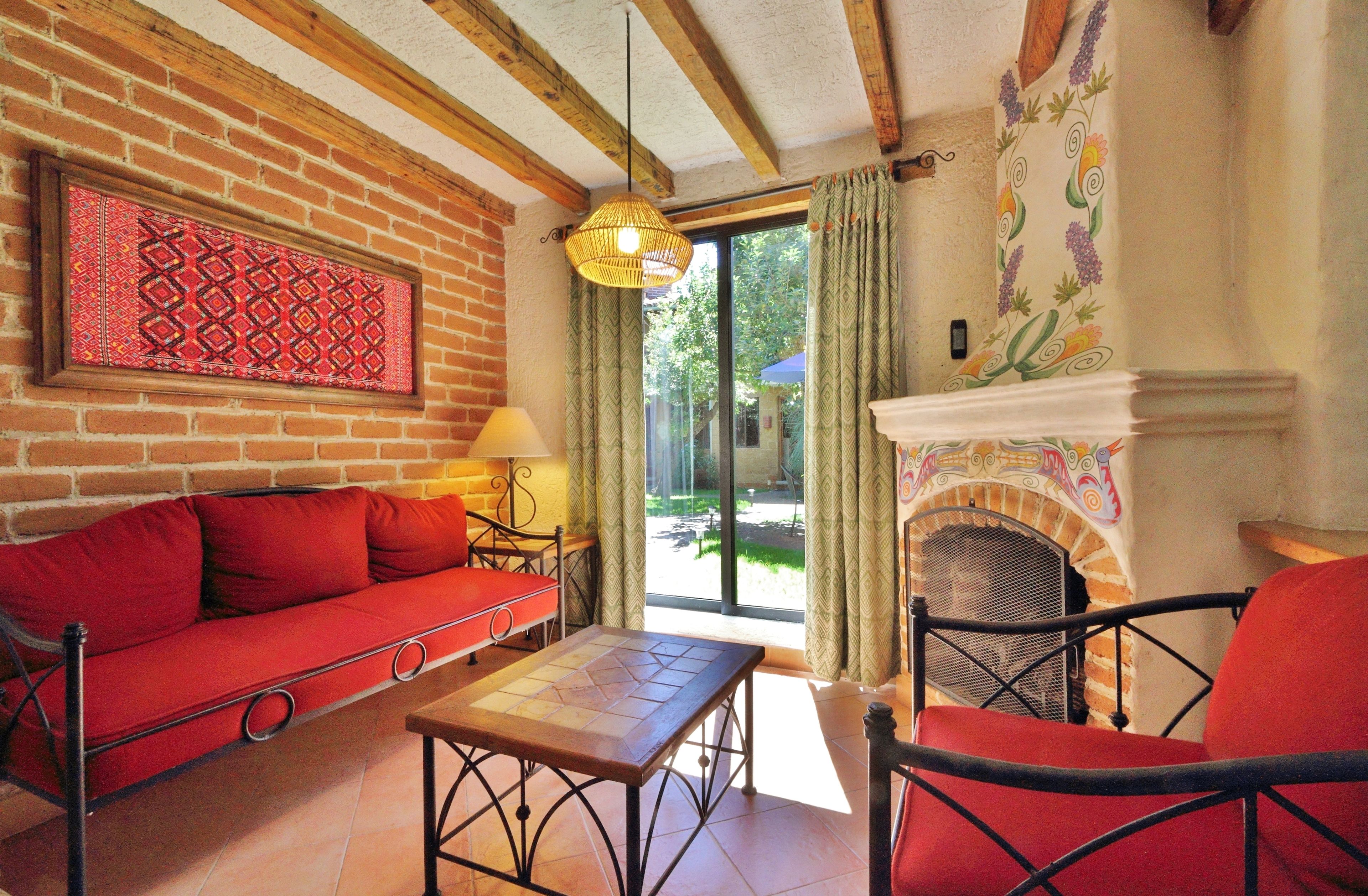 junior suite | living room | 32-inch lcd tv with cable channels, tv, ipod dock