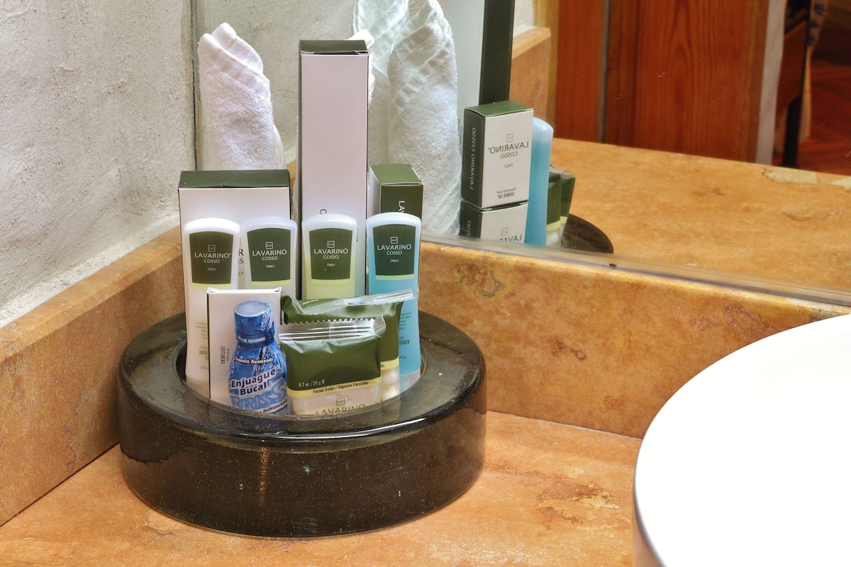 junior suite | bathroom amenities | shower, eco-friendly toiletries, hair dryer, bathrobes