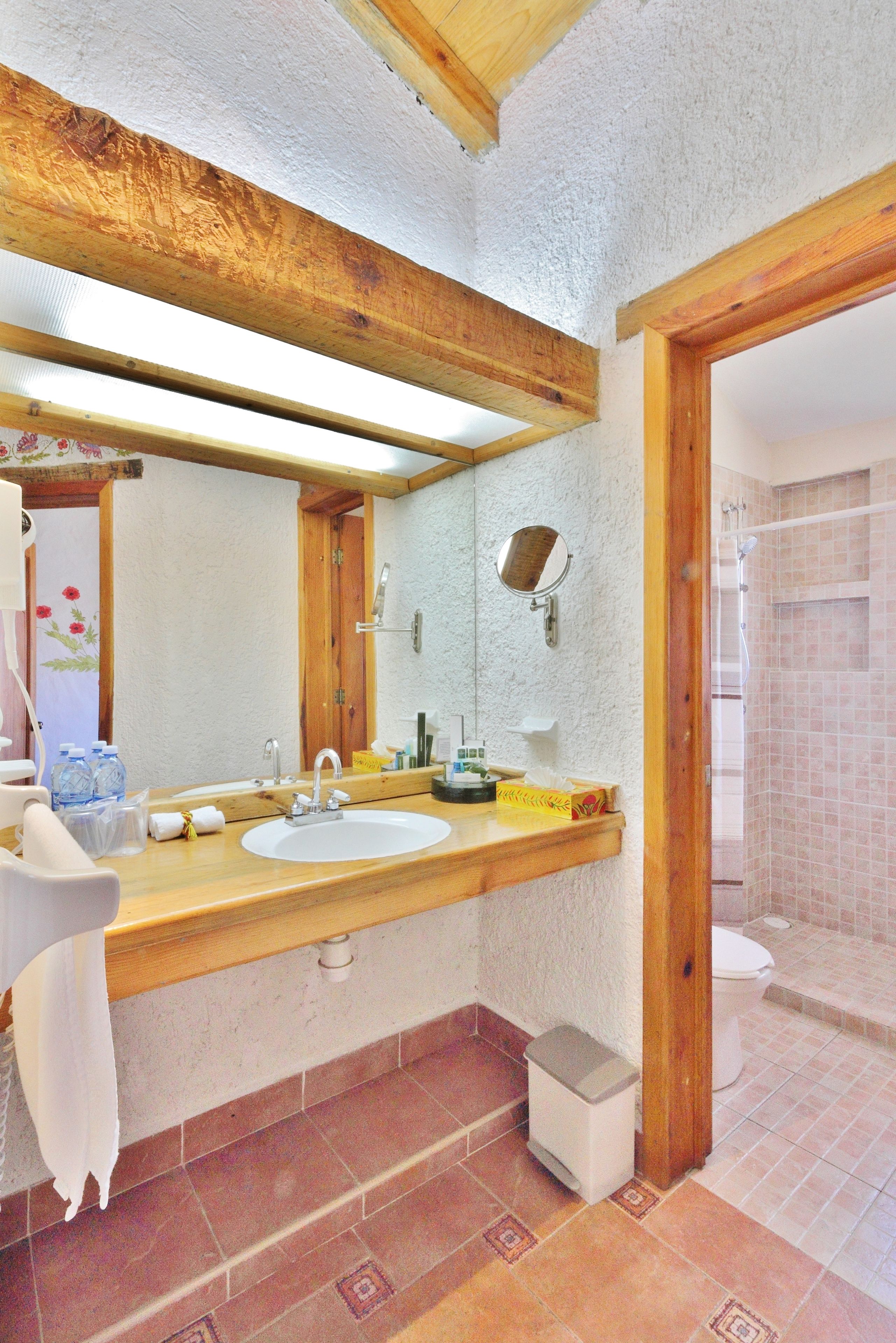 superior villa | bathroom | shower, eco-friendly toiletries, hair dryer, bathrobes