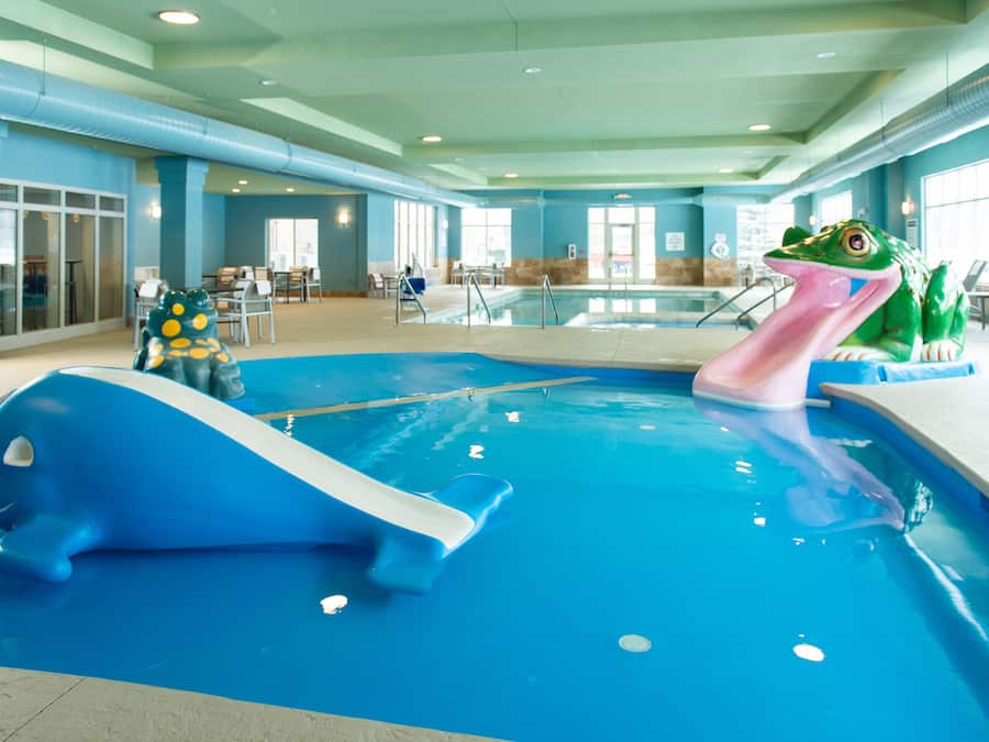 Indoor pool, open 7:00 AM to midnight, pool loungers