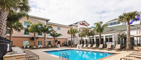 Outdoor pool, open 9:00 AM to 10:00 PM, pool umbrellas, sun loungers