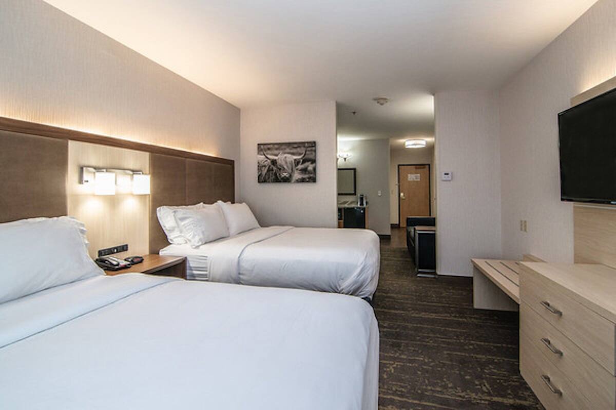 Suite, 1 dormitori (Living Area) | Roba de llit d'alta qualitat i escriptori 