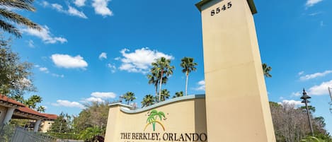A sign for The Berkley, Orlando, a vacation village resort.