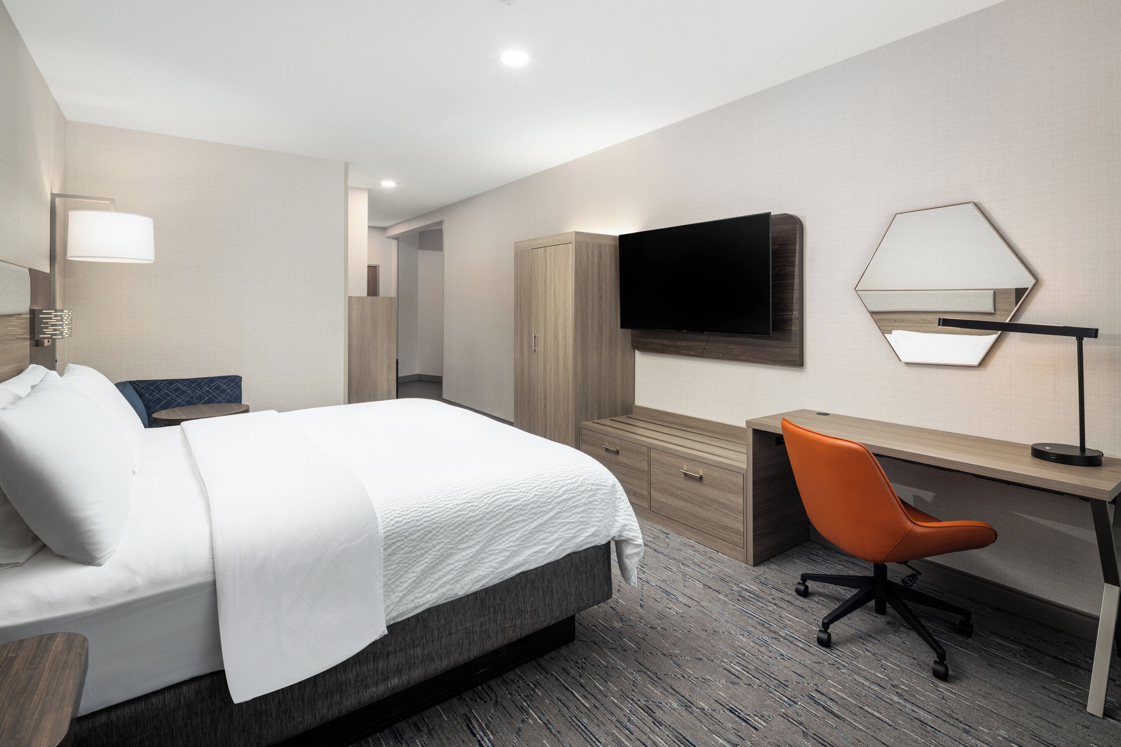 Suite, 1 King Bed (Additional Living Area) | Desk, laptop workspace, blackout drapes, iron/ironing board