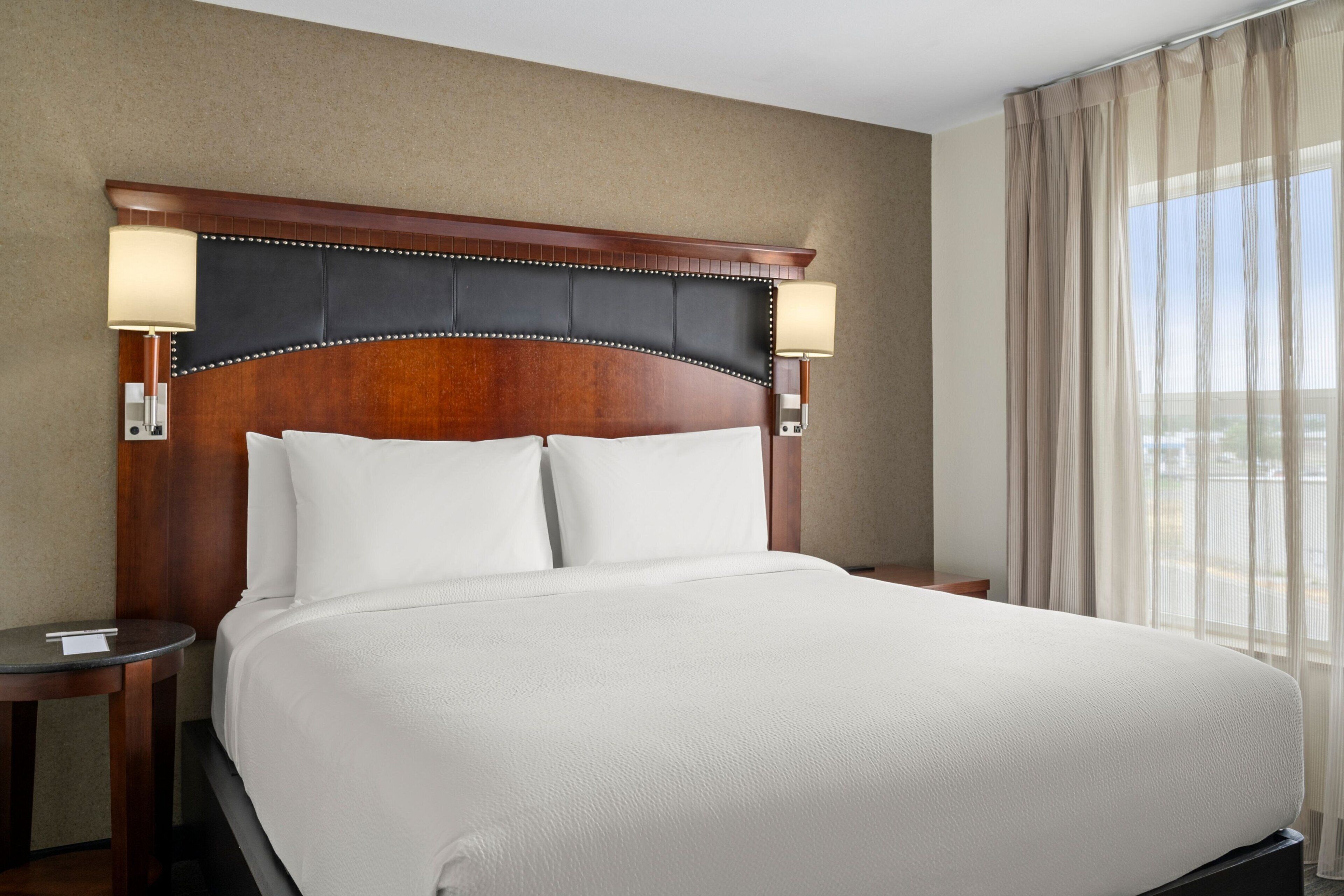 hypo-allergenic bedding, desk, blackout curtains, iron/ironing board