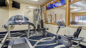 A fitness center with treadmills, elliptical machines, and weight machines. - Quality Inn Kenai (Kenai)