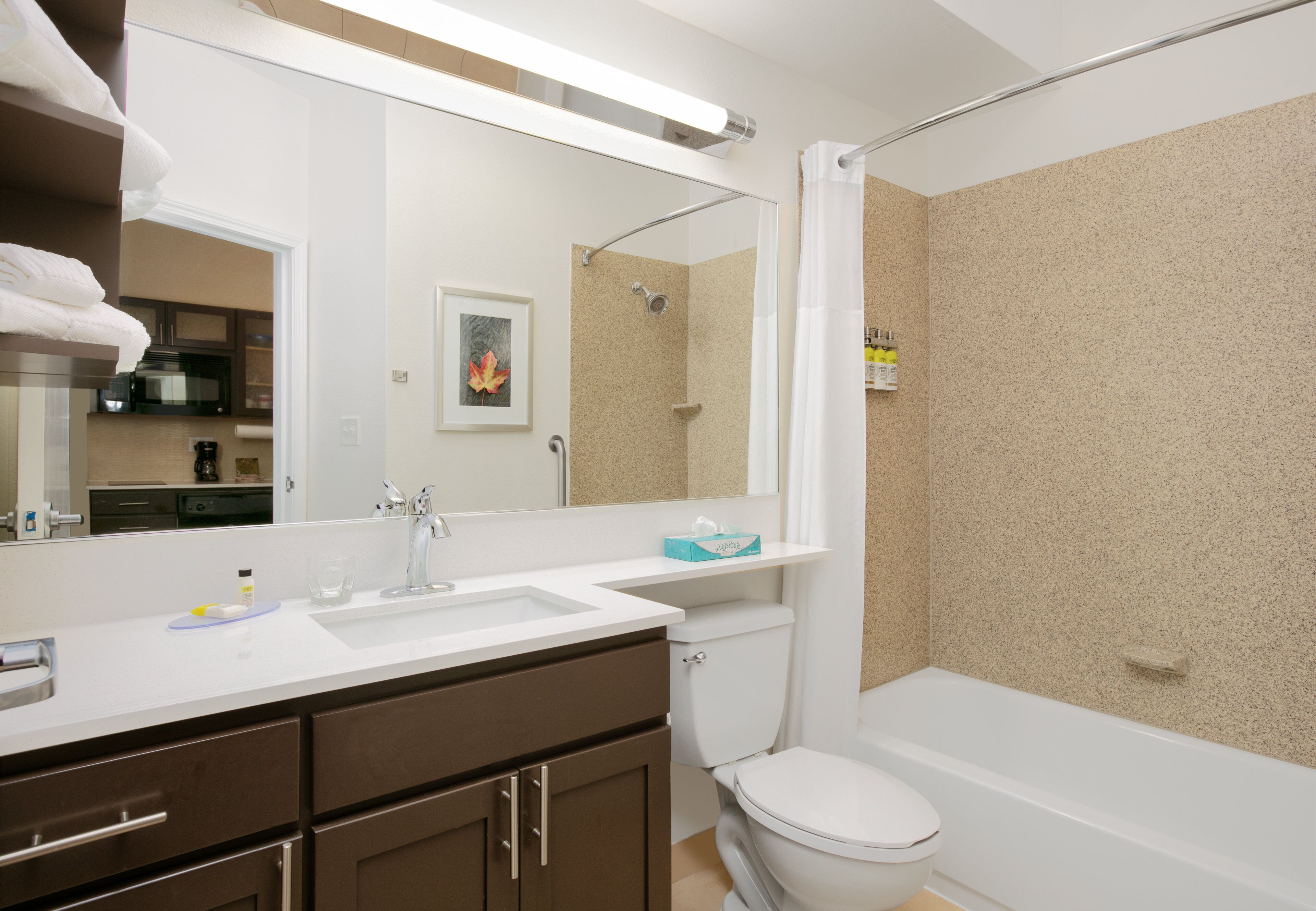 studio suite, 1 queen bed | bathroom | combined shower/bathtub, free toiletries, hair dryer, towels
