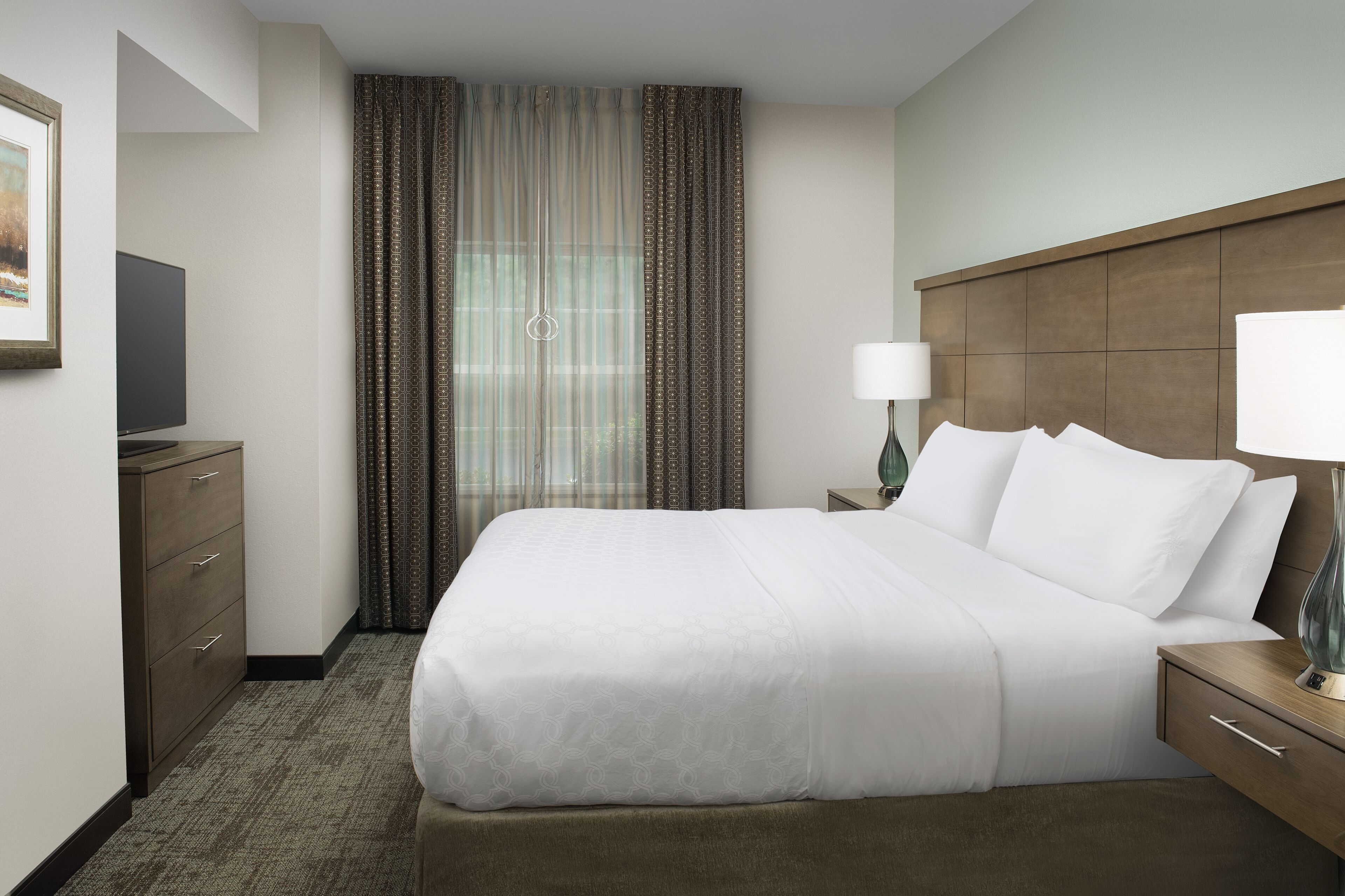 pillow-top beds, desk, blackout curtains, iron/ironing board