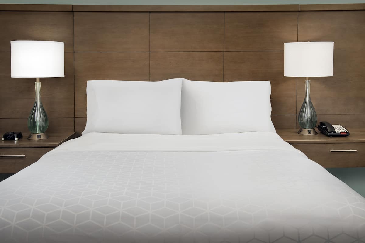 pillow-top beds, desk, blackout curtains, iron/ironing board