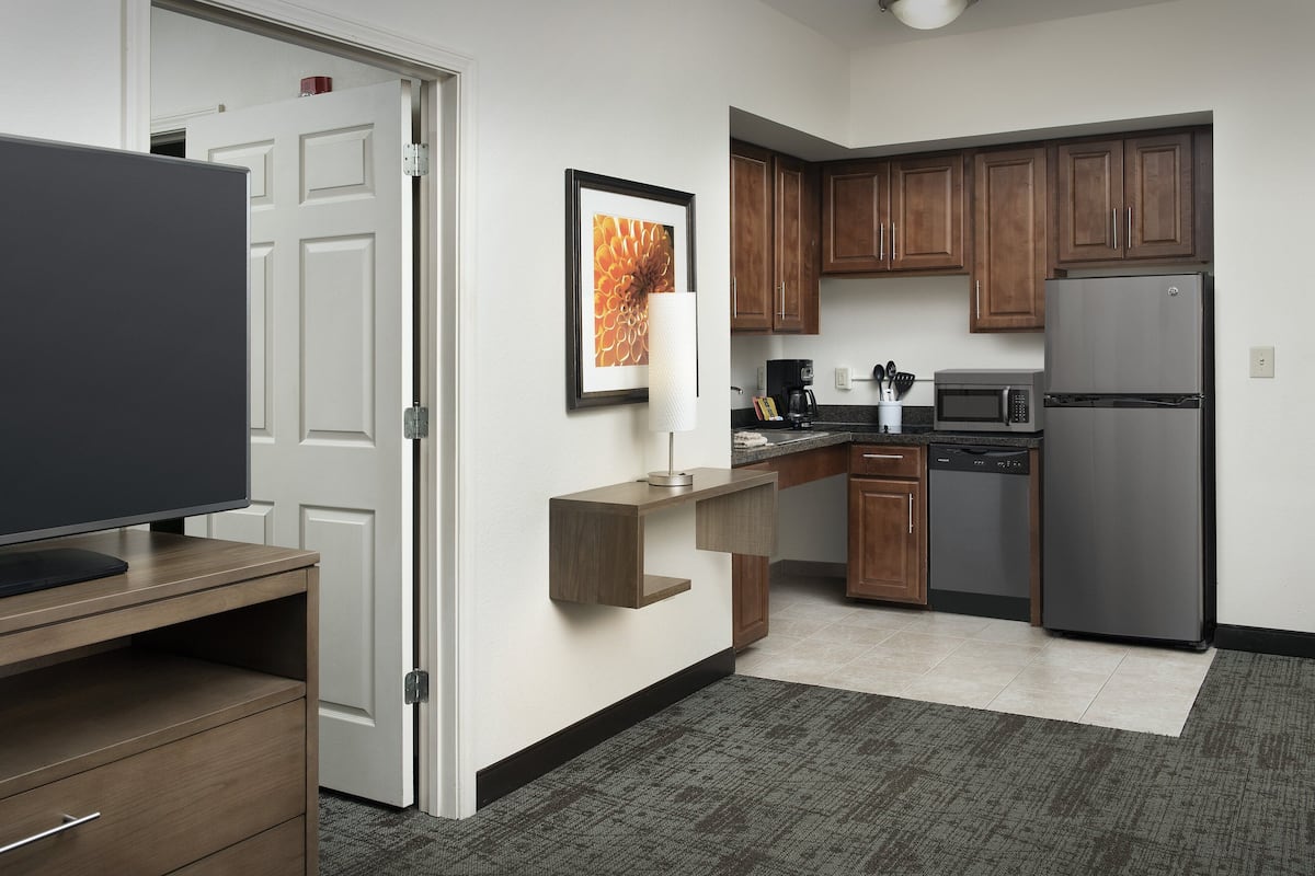 fridge, microwave, coffee/tea maker, cookware/dishes/utensils