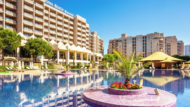 A hotel with a large pool, sun loungers, and a building with balconies. - Barceló Royal Beach – All Inclusive (Sunny Beach)