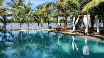 Outdoor pool, pool umbrellas, sun loungers