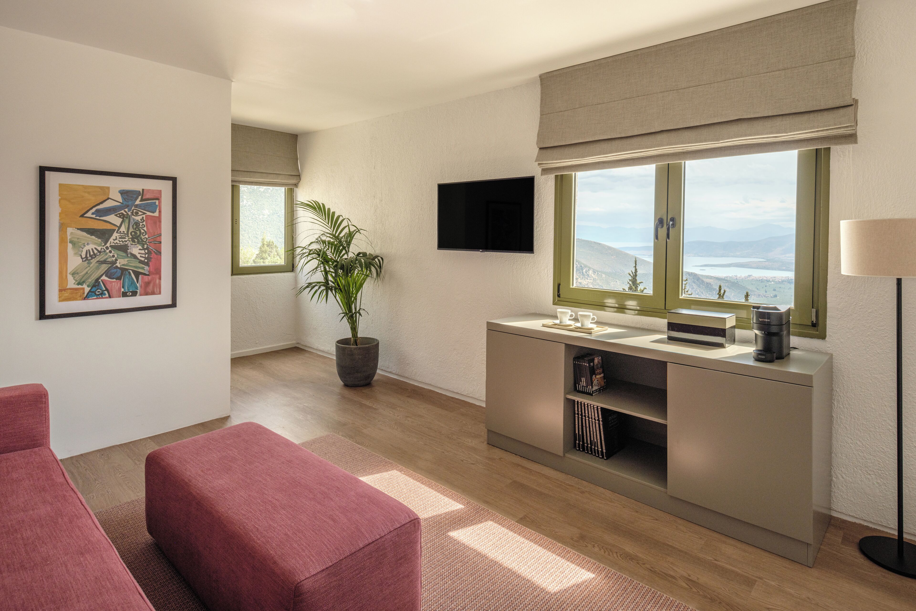 junior suite | living area | 21-inch flat-screen tv with satellite channels