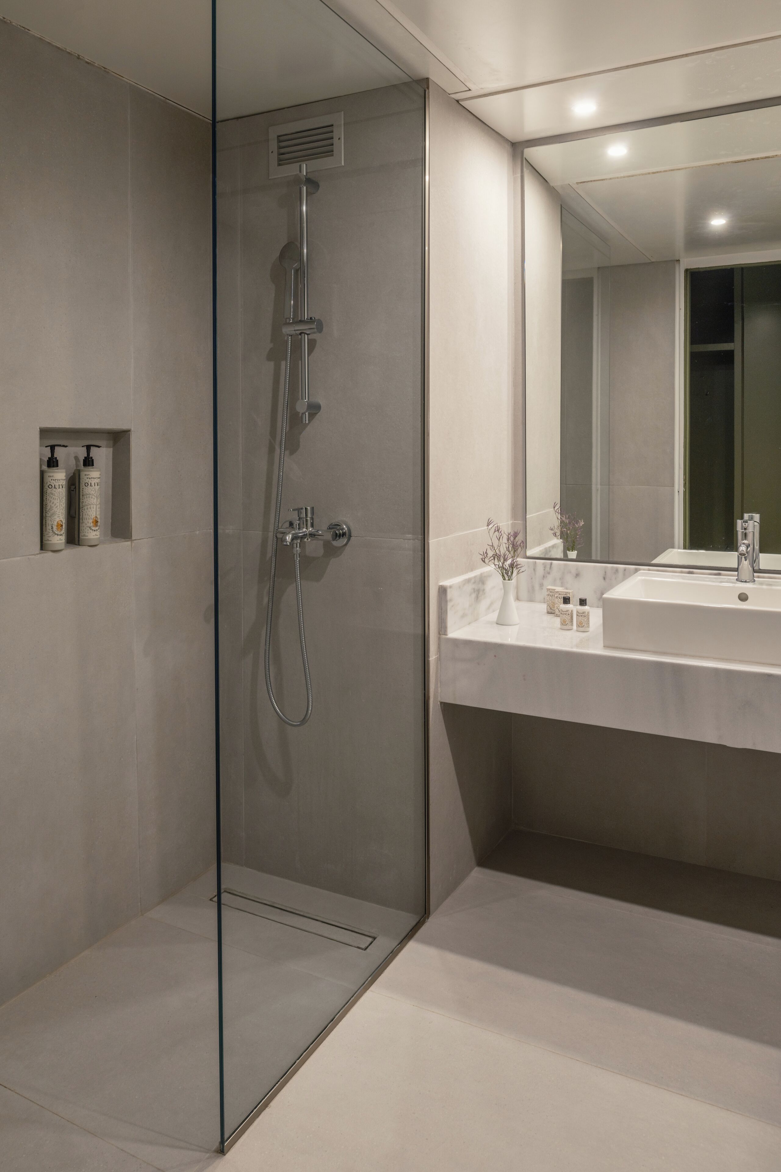 bathtub, eco-friendly toiletries, hair dryer, towels