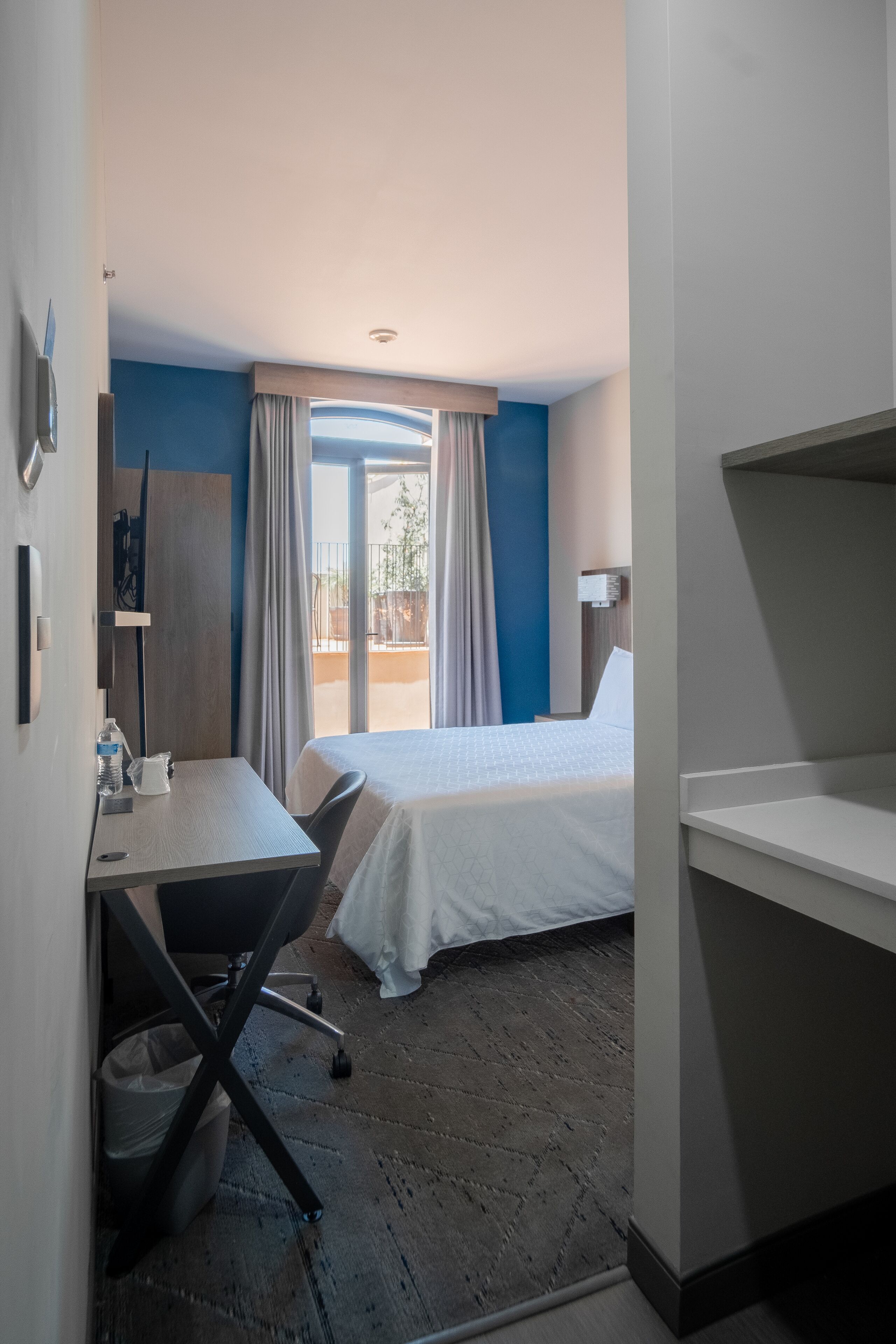 Standard Room, 1 Queen Bed, Terrace, City View (Central Building) | Desk, laptop workspace, soundproofing, iron/ironing board