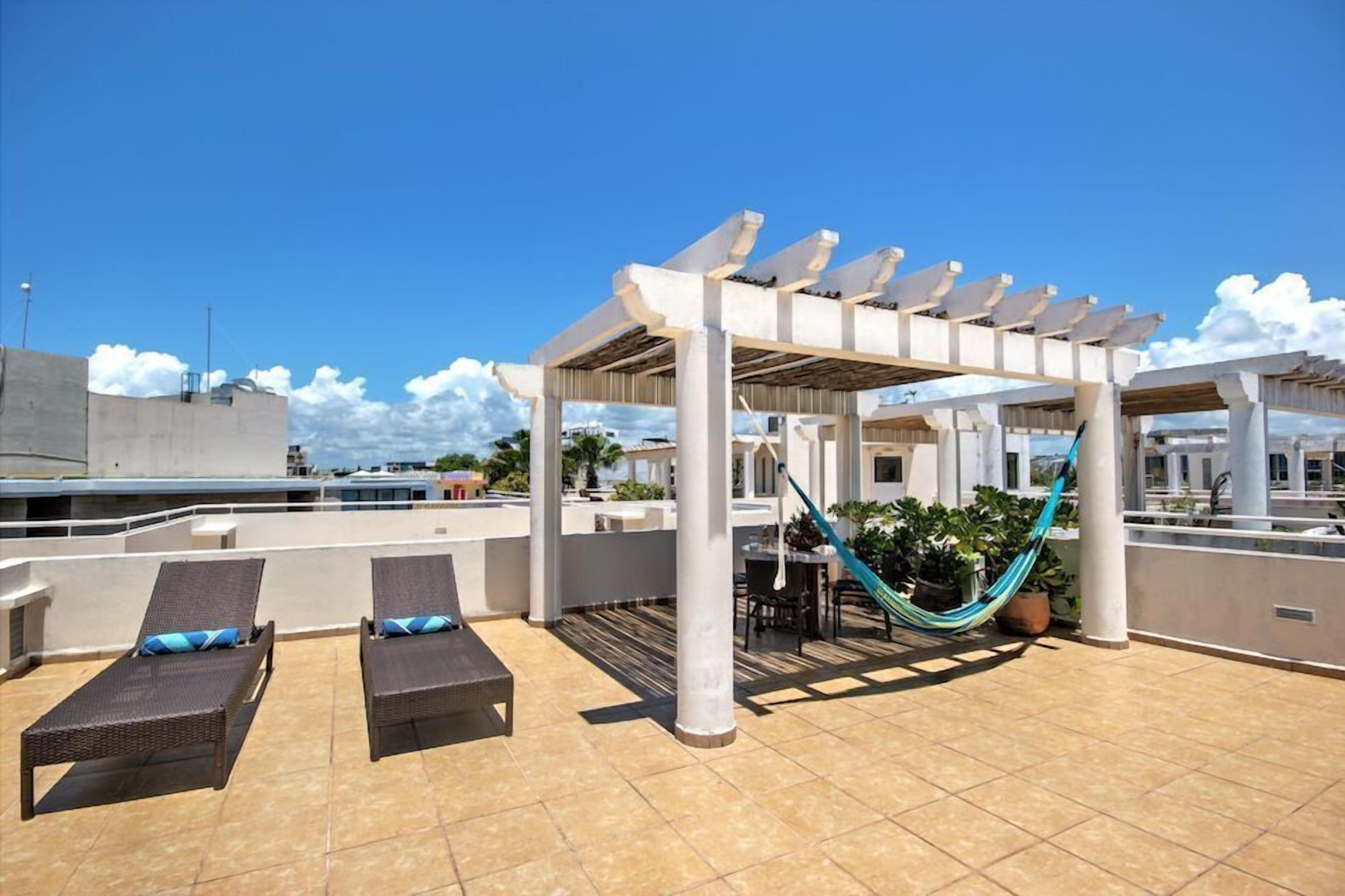 Palmar 2 recamaras Penthouse vista al jardín | Terraza o patio