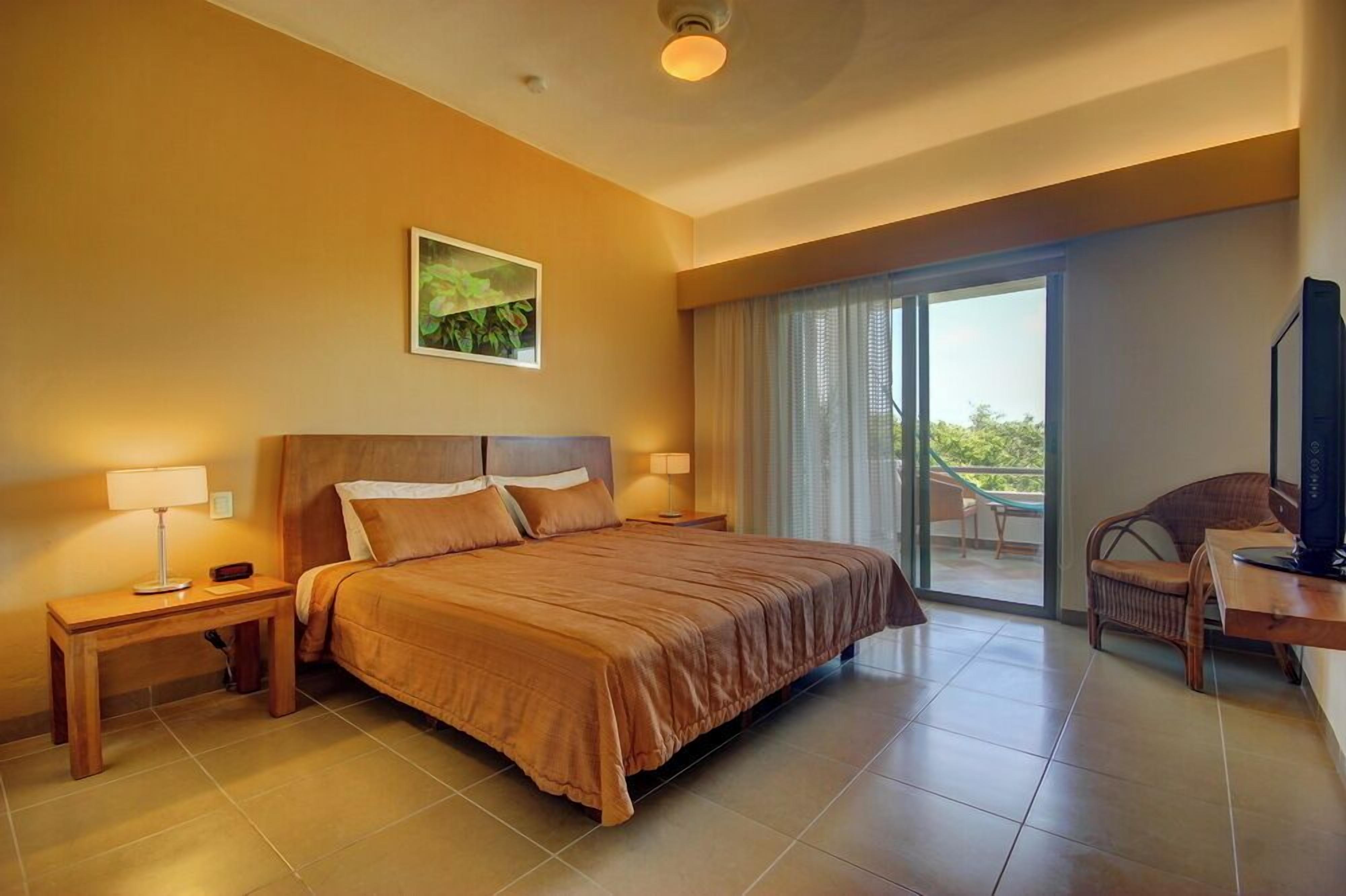 Standaard appartement, 2 slaapkamers, uitzicht op tuin | Luxe beddengoed, een kluis op de kamer, individueel gedecoreerd