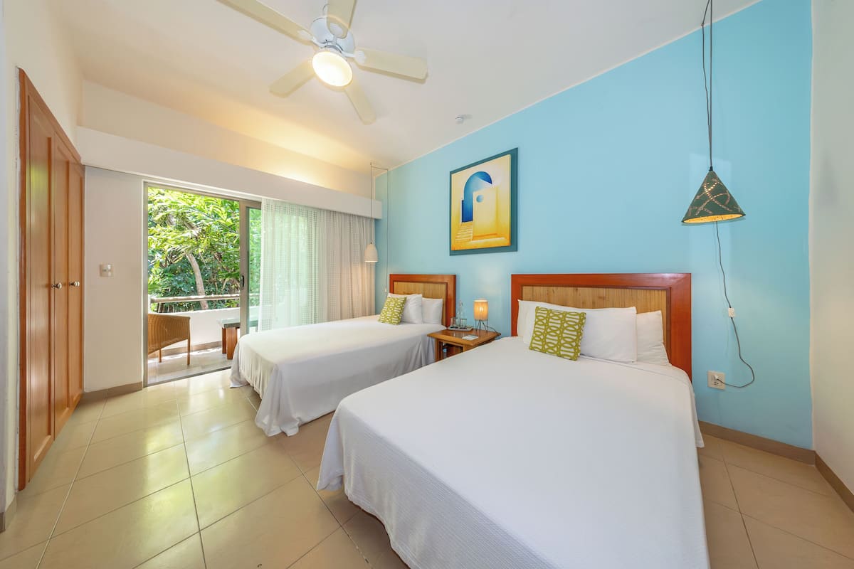 Basic Triple Room, Non Smoking, Air conditioning | In-room safe, iron/ironing board, free WiFi, individually decorated