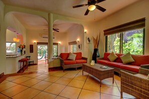Garden Villa | Living area | 40-inch flat-screen TV with digital channels, TV