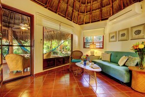 Bungalow 1 King Bed, Kitchen | Living area | 40-inch flat-screen TV with digital channels, TV