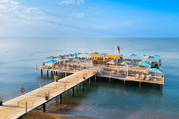Private beach, sun loungers, beach umbrellas, beach volleyball