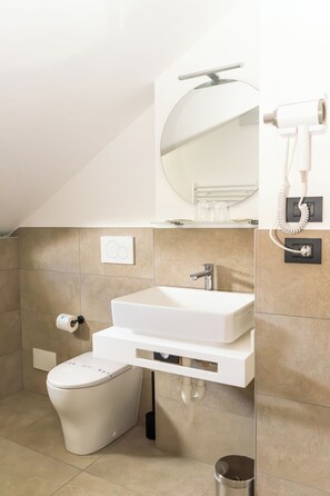 Economy Double Room | Bathroom | Shower, hair dryer, towels