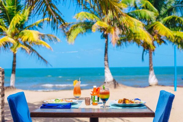 Beach views, serves lunch and happy hour - Hopkins Bay Belize, a Muy'Ono Resort (Hopkins)